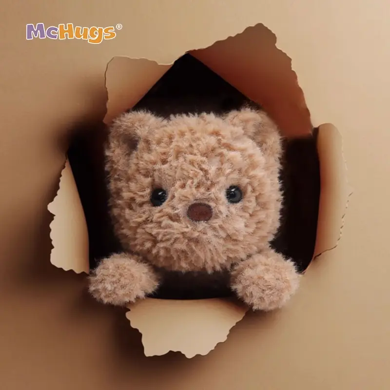 mc400139-peluche petit ours réconfortant-mc hugs-1.webp